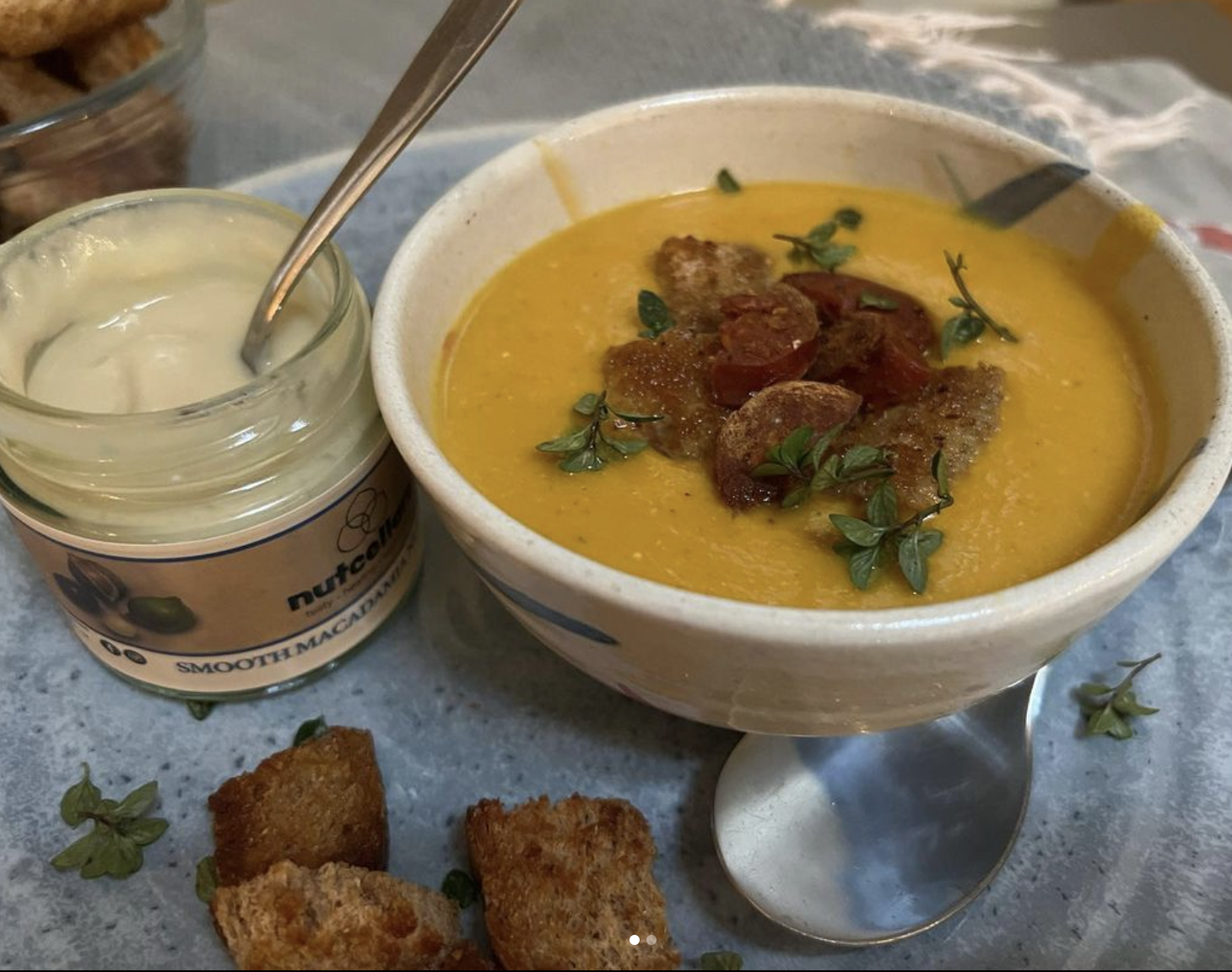 Carrot Macadamia soup with Croutons and Chorizo Garnish